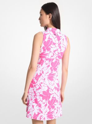 Robe polo de golf en tricot extensible &agrave; fermeture &eacute;clair et &agrave; imprim&eacute; de palmiers in CERISE | Michael Kors