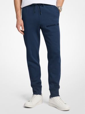 Joggers de mezcla de algod&oacute;n con logotipo en relieve