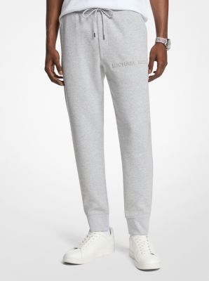 Michael Kors Embossed Logo Cotton Blend Joggers In Gray
