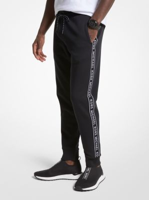 Pantalon de jogging en mélange de coton à imprimé à logo